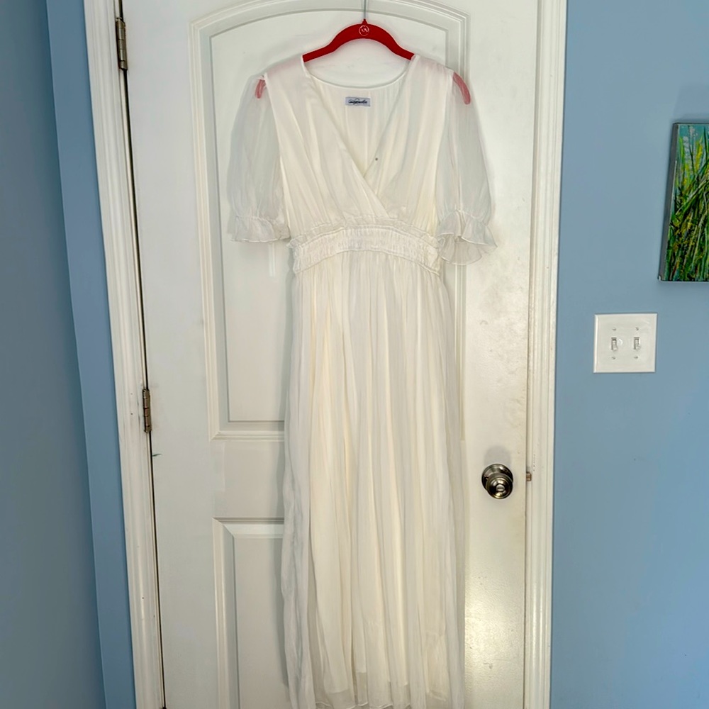 Long white ruffle sleeve maxi dress from Magnolia Boutique; size small.